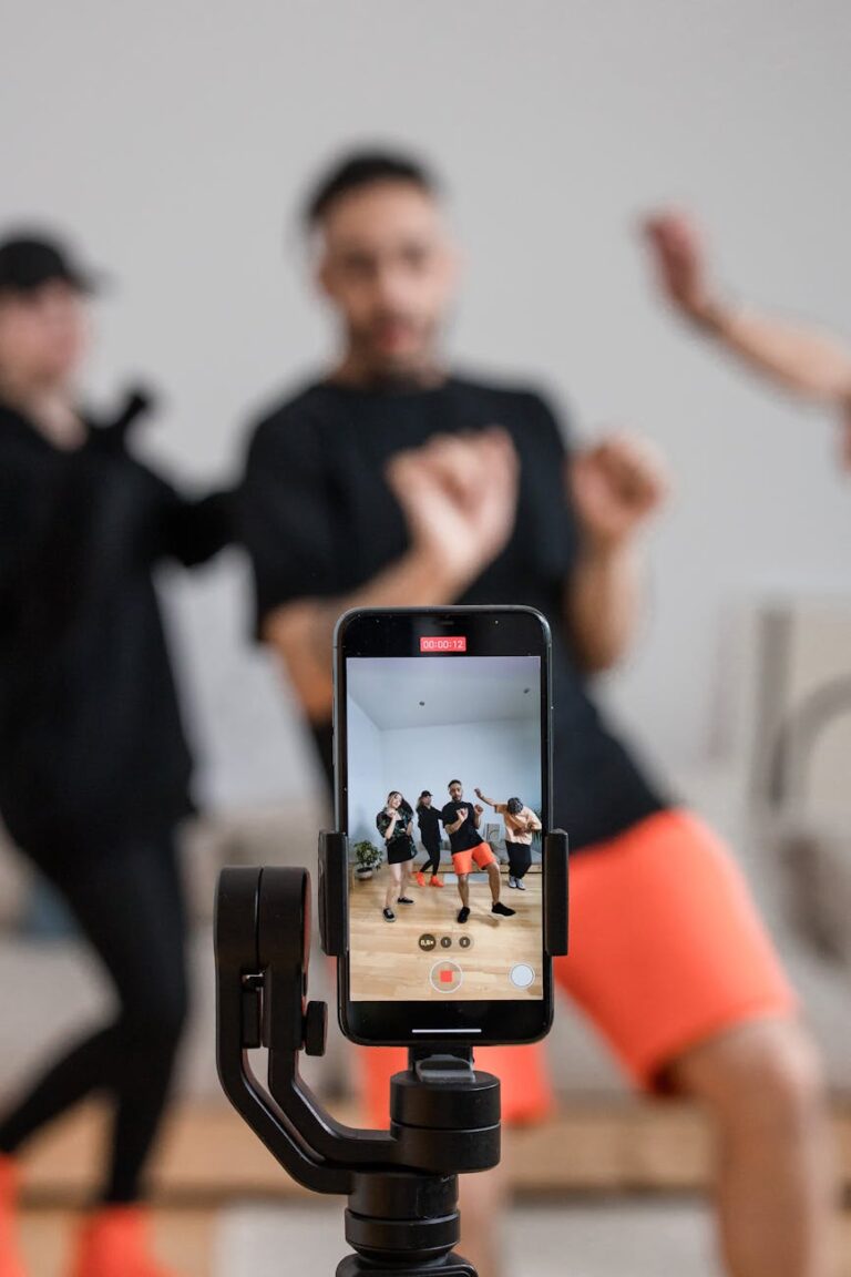 shallow focus of people recording a video using a smartphone